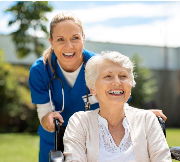 caregiver and senior smiling