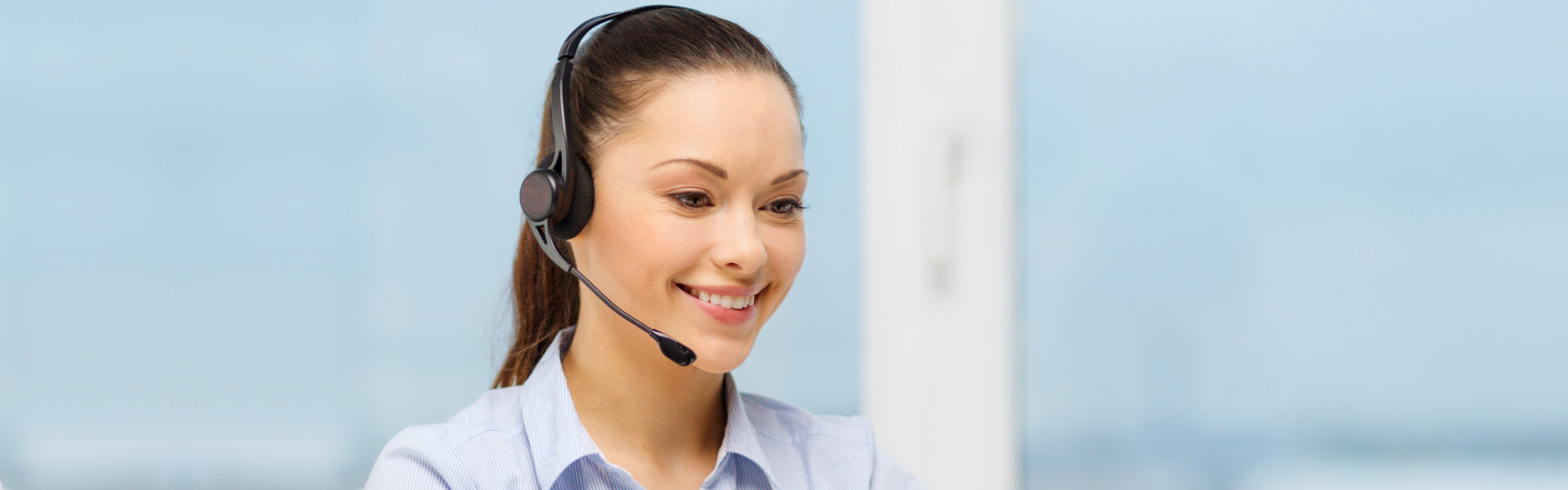 woman with headset smiling